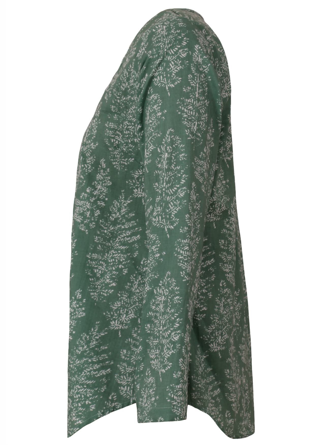 Side image of long sleeve cotton top with sage green based floral print.