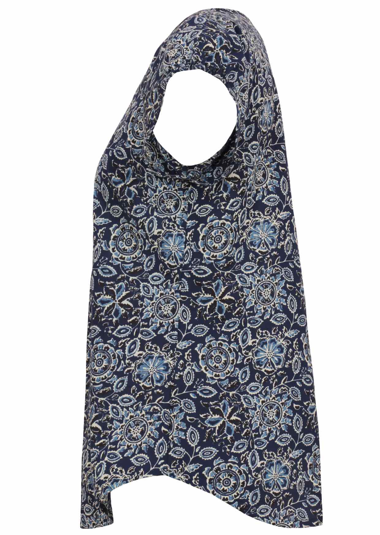 Side view of navy blue based floral print cotton top with cap sleeves.