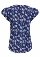 Back image of short sleeve cotton top with navy blue based floral print.