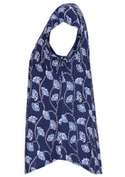 Side image of short sleeve cotton top with navy blue based floral print.