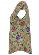 Green base with multi-coloured folk art style floral print cotton top on a white background.