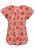 Cream based warm floral print cotton top with U-shaped neckline.