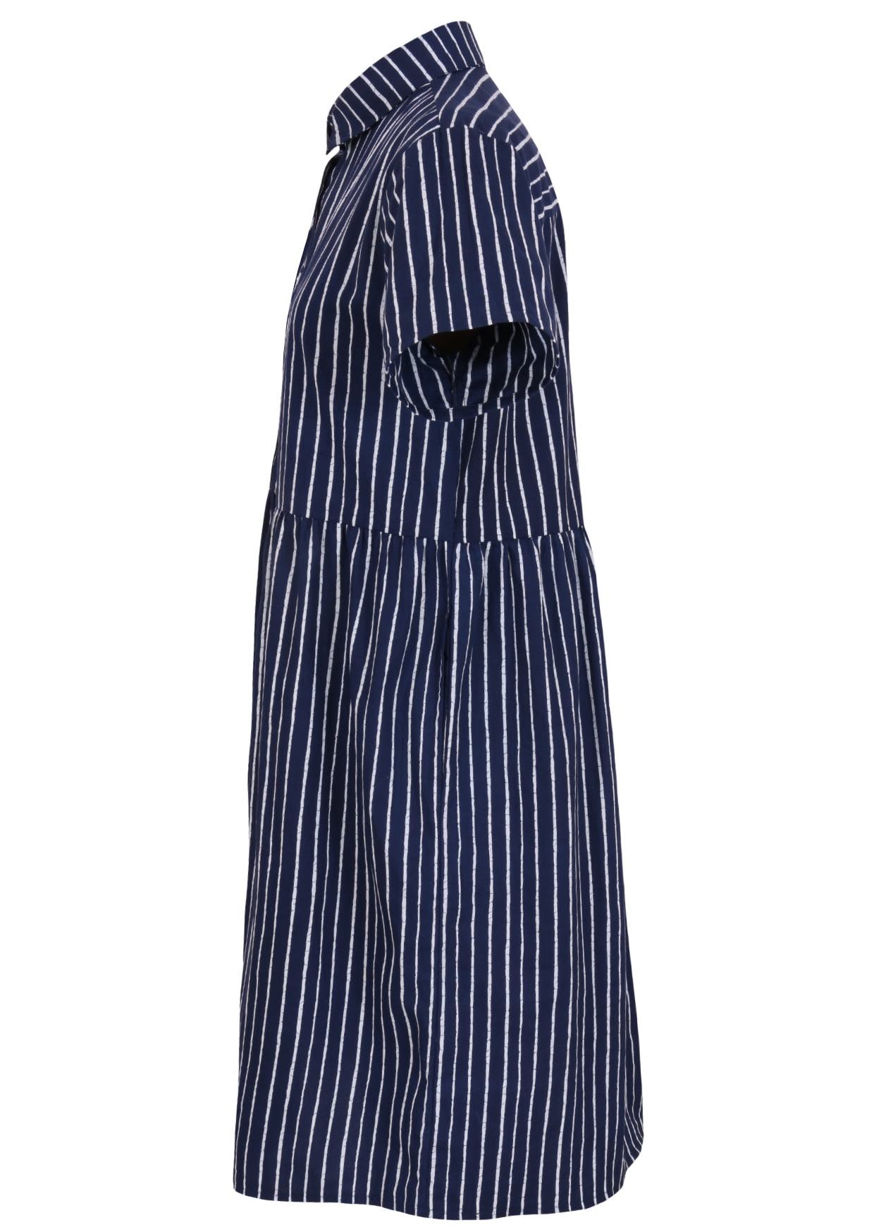 Side view of shikari print on dark blue base cotton relaxed fit collared short sleeve dress with hidden side pockets