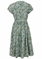 Back view of 50's style cotton midi length dress with a waist tie and cap sleeves