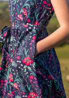 close up of hands in pockets of Vivien Dress navy cotton 