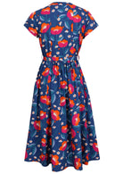 Back view of 50's style cotton midi length dress with a waist tie and cap sleeves
