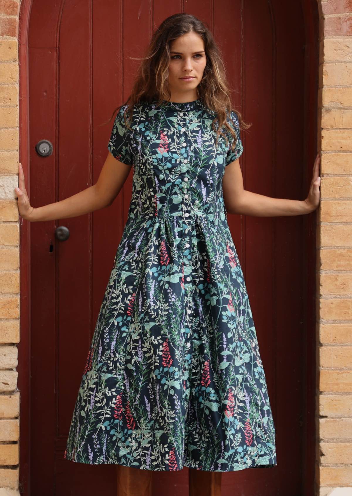 Cotton retro dress in gorgeous floral print with deep teal base