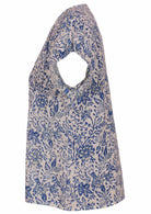 white based blue floral print cotton top with coconut buttons.