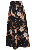 Side view of a black based floral print A-line cotton skirt with hidden side zipper