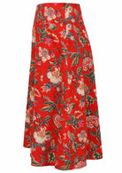 Side view of a red based floral print A-line cotton skirt with hidden side zipper
