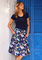 A-line over the knee cotton skirt has pockets and wide waistband with hidden side zip