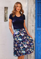 100% cotton generous A-line skirt with pockets in blue floral print with birds