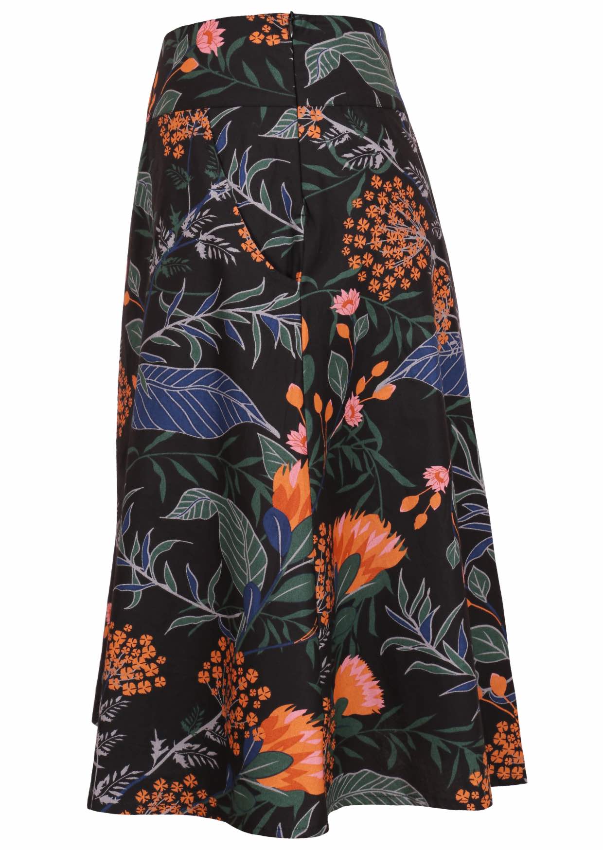 Side view of a black botanical print A-line cotton skirt with hidden side zipper