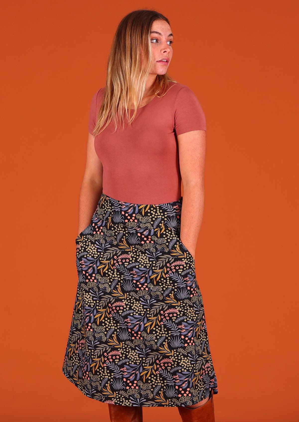 Wear this cotton A-line skirt on the waist or lower to the hips