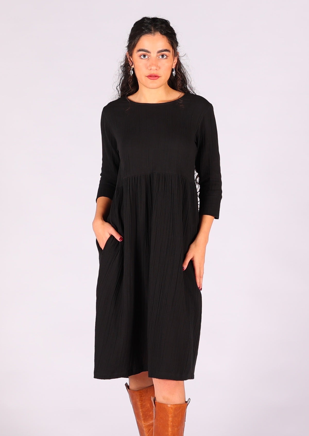 Black double cotton knee length dress with round neckline and hidden side pockets