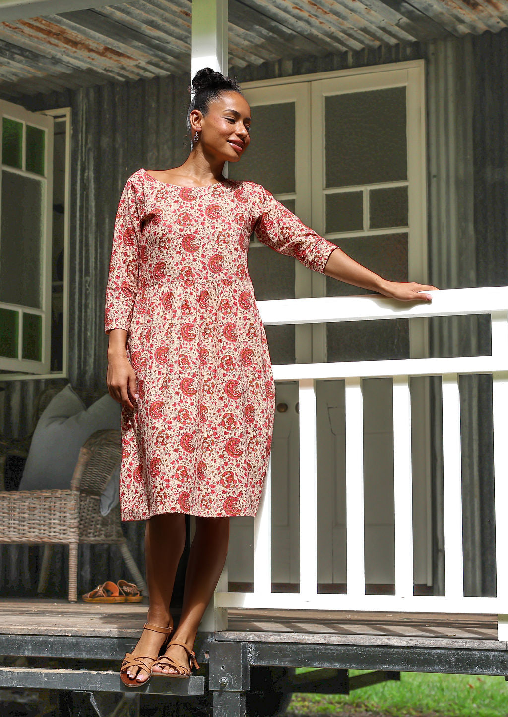 Woman in floral knee length sundress with sleeves, 100% cotton with pocket