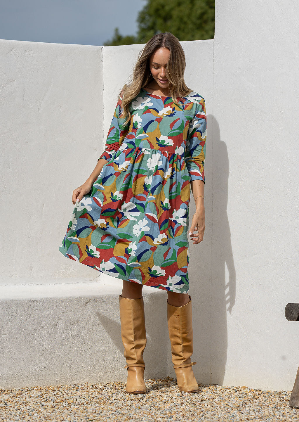 Woman in floral knee length sundress with sleeves, 100% cotton with pocket