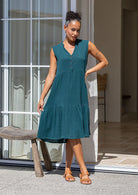 Woman wearing the Ember Midi Dress Deep Teal in double cotton gauze