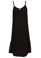 Black cotton voile slip dress with adjustable spaghetti straps, V-neckline, side splits and a picot trim hem, front view