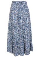 White based blue floral print skirt on a white background.