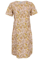 Front view of cotton dress with round neckline in cream based floral print