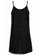 Black cotton slip for undergarment with thin adjustable straps and lace-trimmed hem, flat lay