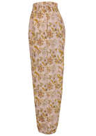 Side view of floral print wide leg cotton pants with pleated ankles, high elastic waist and pockets