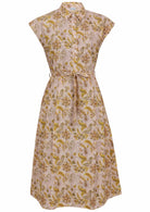 Cream based floral print cotton dress with removable waist tie.