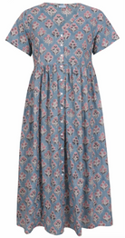 Woman standing in a 100% cotton floral print dress with a V-neckline, short sleeves, pockets, and buttons through to the knee.