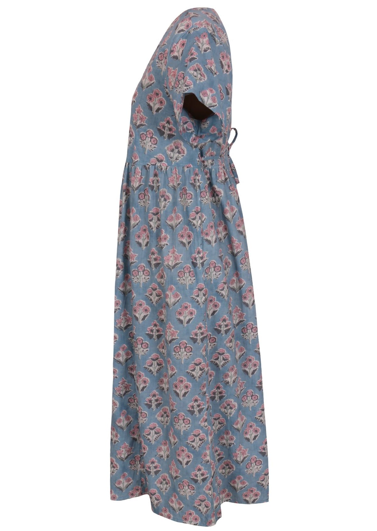 Side view of powder blue based floral print V-neck cotton dress with pockets.