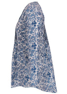 White based blue floral print cotton button through shirt with long sleeves, that is longer at the back