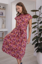 Model in a Japanese style floral print shirt style 100% cotton dress with cap sleeves and detachable waist tie