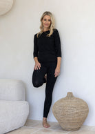 Woman wearing full length jersey fabric leggings