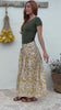 Video of a woman wears 100% cotton button through skirt in cream based floral print. 