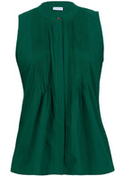 The front side of the top with a dark green sleeveless blouse with pleats.
