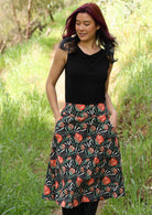 100% cotton A-line skirt with wide waistband, side zip and pockets