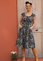 Striking wattle print in greys and yellow on dark blue base cotton retro inspired dress