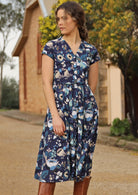 Blue toned floral print cotton midi length button through dress